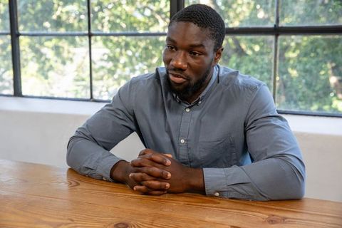 African american professional in corporate meeting room