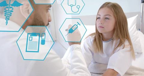 Doctor interacting with virtual medical icons at pediatric bedside with young patient