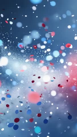 Swirling red white blue confetti drifting over hazy bokeh backdrop vertical celebration loop