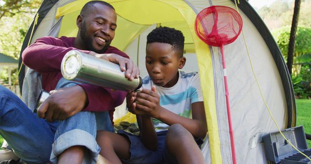 Father and Son Enjoying Camping Outdoors - Download Free Stock Images Pikwizard.com