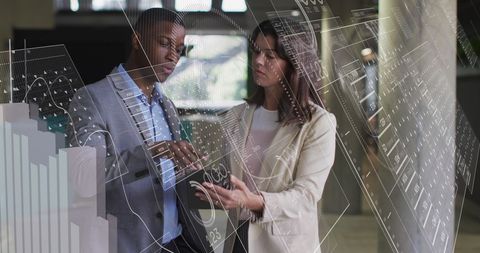 diverse businesspeople analyzing virtual financial data in office - Download Free Stock Images Pikwizard.com