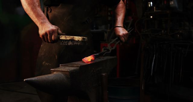 Blacksmith Crafting Metal on Anvil in Workshop - Download Free Stock Images Pikwizard.com