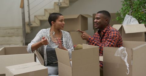 Couple Unpacking Moving Boxes in New Home - Download Free Stock Images Pikwizard.com