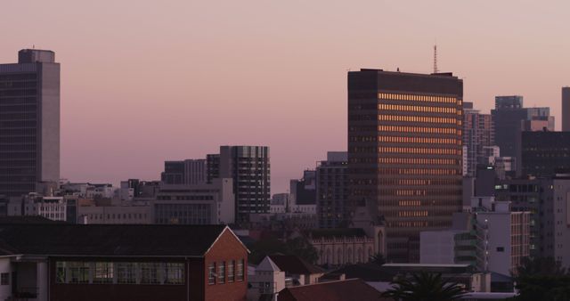 General view of cityscape with multiple modern buildings with clear sky at sunset. skyline and urban architecture.