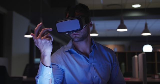 Man Exploring Virtual Reality in Office at Night  - Download Free Stock Images Pikwizard.com