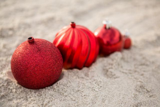 Christmas Baubles on Beach Sand - Download Free Stock Photos Pikwizard.com