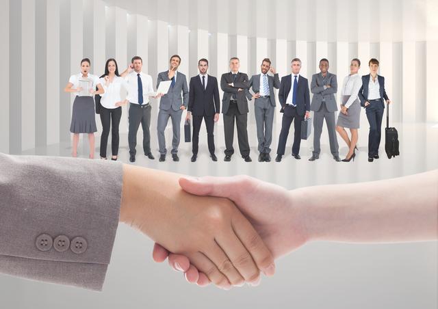 Digital composition of business executives shaking hands against with business colleagues standing in background