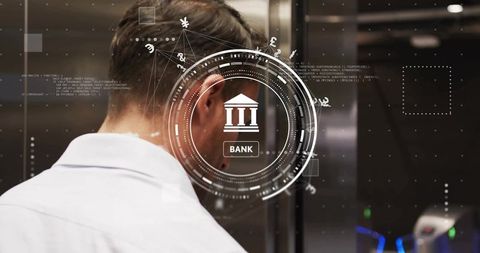 Male Interacting with Holographic Bank Interface Featuring Currency Symbols