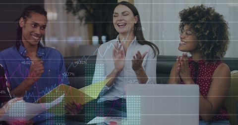 Diverse Business Team Discussing Data with Digital Overlay