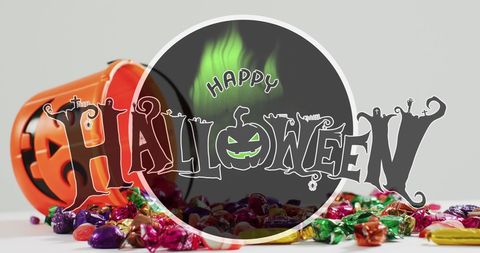 Halloween Candy Spilled from Pumpkin Bucket - Download Free Stock Images Pikwizard.com