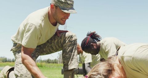 Military Instructor Leading Obstacle Course Training Outdoors
