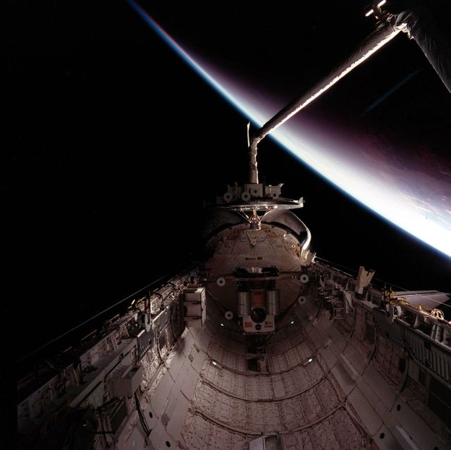 Spacecraft in Orbit with Earth's Horizon View - Download Free Stock Images Pikwizard.com