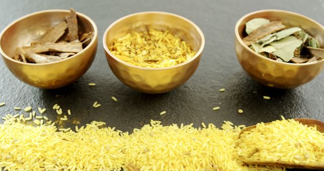 Bowls of Spices and Yellow Rice on Dark Surface Highlighting Asian Cuisine - Download Free Stock Images Pikwizard.com