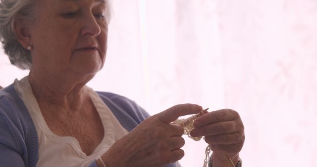 Elderly Woman Knitting with Focus - Download Free Stock Images Pikwizard.com