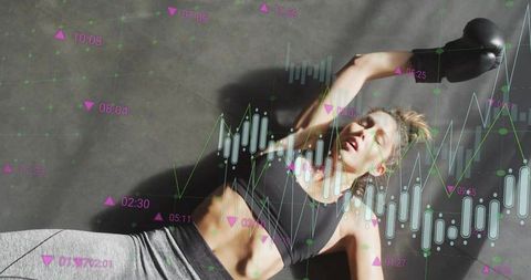 Female boxer combining fitness and digital data visualization
