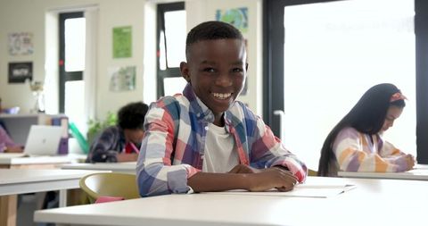 Smiling Student Enjoying Modern Classroom Environment