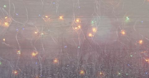 Glowing christmas lights over winter blend