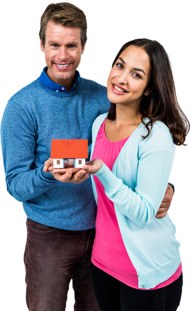 Smiling Couple Holding a Transparent House Model, Embracing Home Ownership - Download Free Stock Videos Pikwizard.com