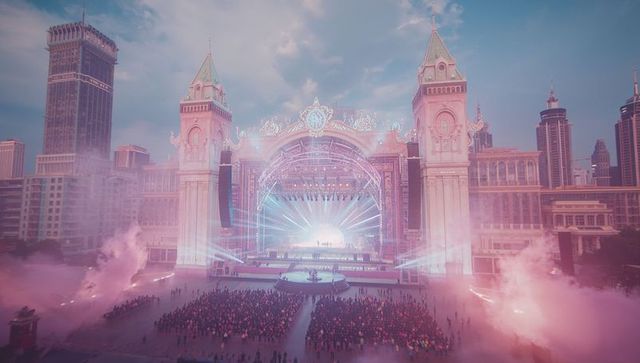 Grand concert stage illuminated with lasers and colorful fog in urban plaza