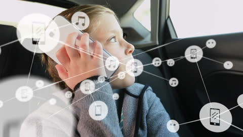 Boy Engaging with Smartphone Connectivity in Car Ride