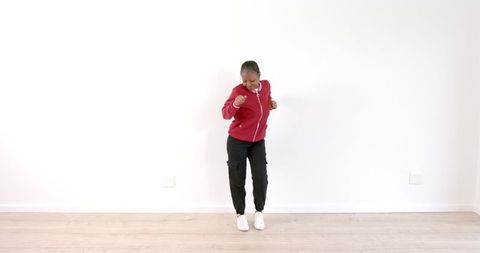 African American Woman Expressing Joyful Dance Moves