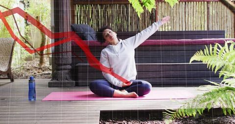 Outdoor yoga side-stretch on wooden deck practicing mindfulness and stress relief