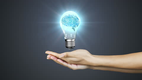 Human Brain Inside Light Bulb Symbolizing Innovation and Technology