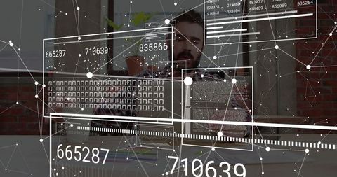 Man coding software on laptop with data and technology overlay