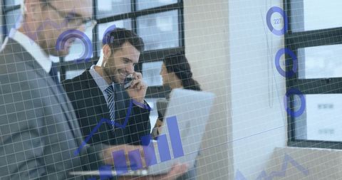 business professionals analyzing data with overlayed graphics - Download Free Stock Images Pikwizard.com