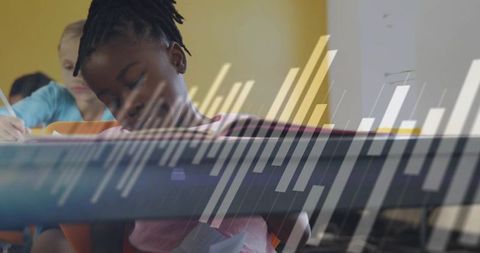 Focused schoolchildren immersed in classroom activities