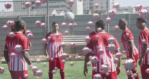Football Players Amidst Animated Virus Cells During Pandemic