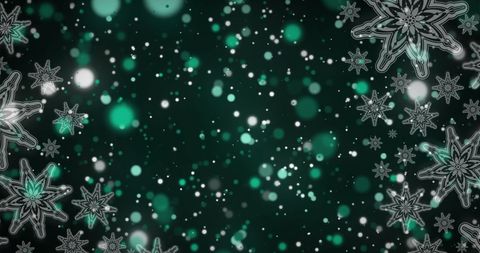 Snowflakes and green light spots on black background