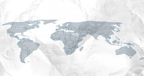Crumpled paper world map displaying infographic data markers and minimalist blue design