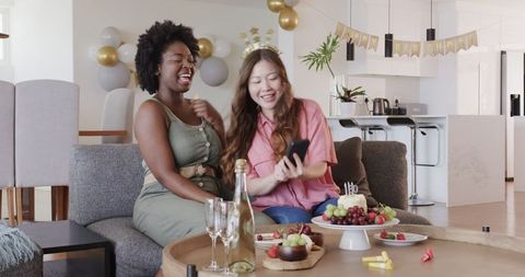 Interracial Couple Celebrating Birthday with Selfie at Home