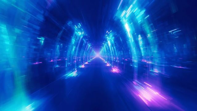 Receding futuristic neon tunnel glowing with blue cyan arches and motion blur