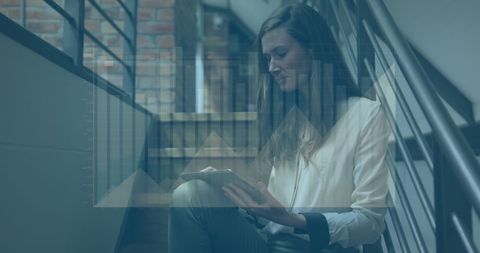 Businesswoman Analyzing Data on Tablet with Overlay of Graphs - Download Free Stock Images Pikwizard.com