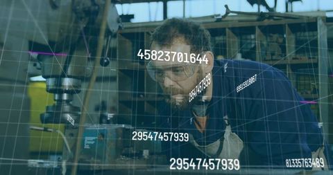 Machinist Inspecting Milling Machine with Digital Data Overlay for Industry 4.0 Workshop