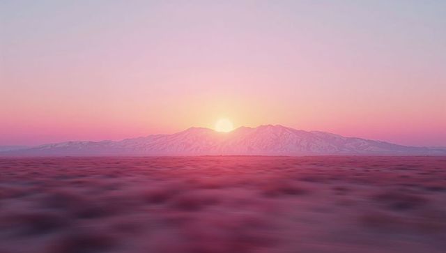 Idyllic Sunrise Over Snowy Mountain Range with Desert Plateau