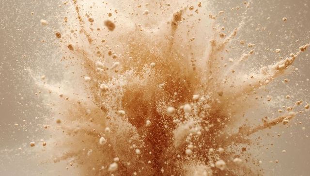 Dynamic Burst of Brown Powder Cloud and Particles