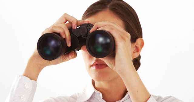 Businesswoman Holding Binoculars for Strategic Planning - Download Free Stock Images Pikwizard.com