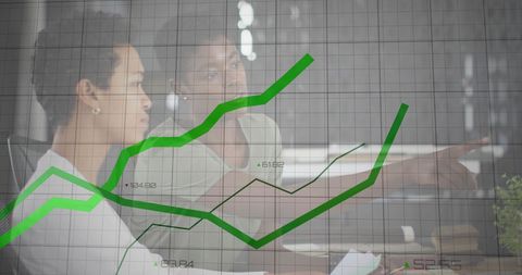 diverse professionals analyzing financial growth charts in modern office - Download Free Stock Images Pikwizard.com