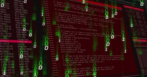 Streaming green binary rain over red terminal code for cybersecurity visualization