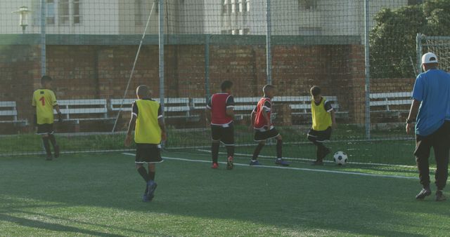 Youth Soccer Team Practicing with Coach on Field - Download Free Stock Images Pikwizard.com