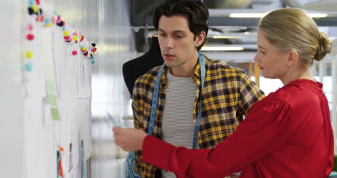 Creative Team Discussing Design Ideas in Modern Office