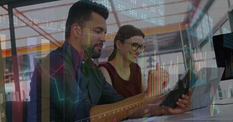 Business Professionals Analyzing Digital Data in Office Collaboration