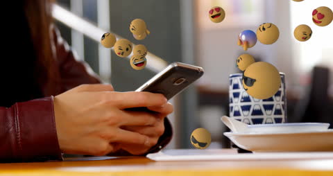 Woman Messaging on Smartphone with Expressive Emojis Display
