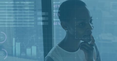 businesswoman analyzing data overlays in modern office - Download Free Stock Images Pikwizard.com