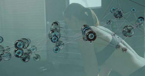 Female athlete leaning forward during gym workout with futuristic molecular network overlay