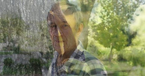 Senior Man Outside with Double Exposure of Trees