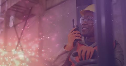 Warehouse Worker with Walkie-Talkie Celebrating Labor Day - Download Free Stock Images Pikwizard.com